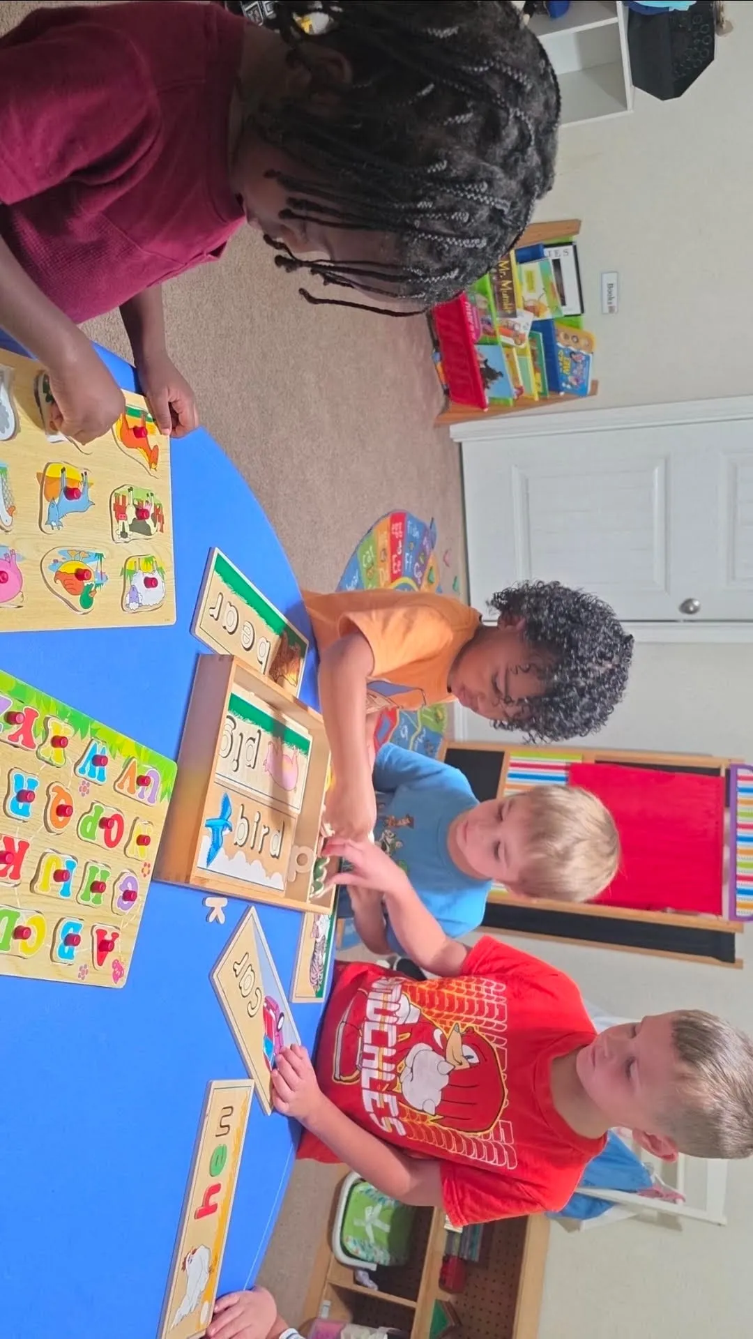 Children happily drawing together in class