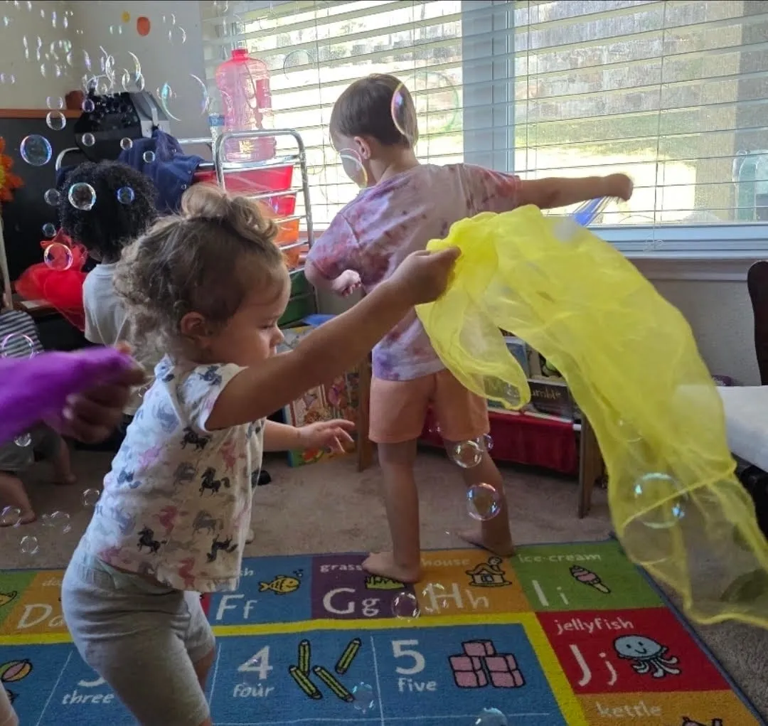 A child concentrating happily on a learning activity